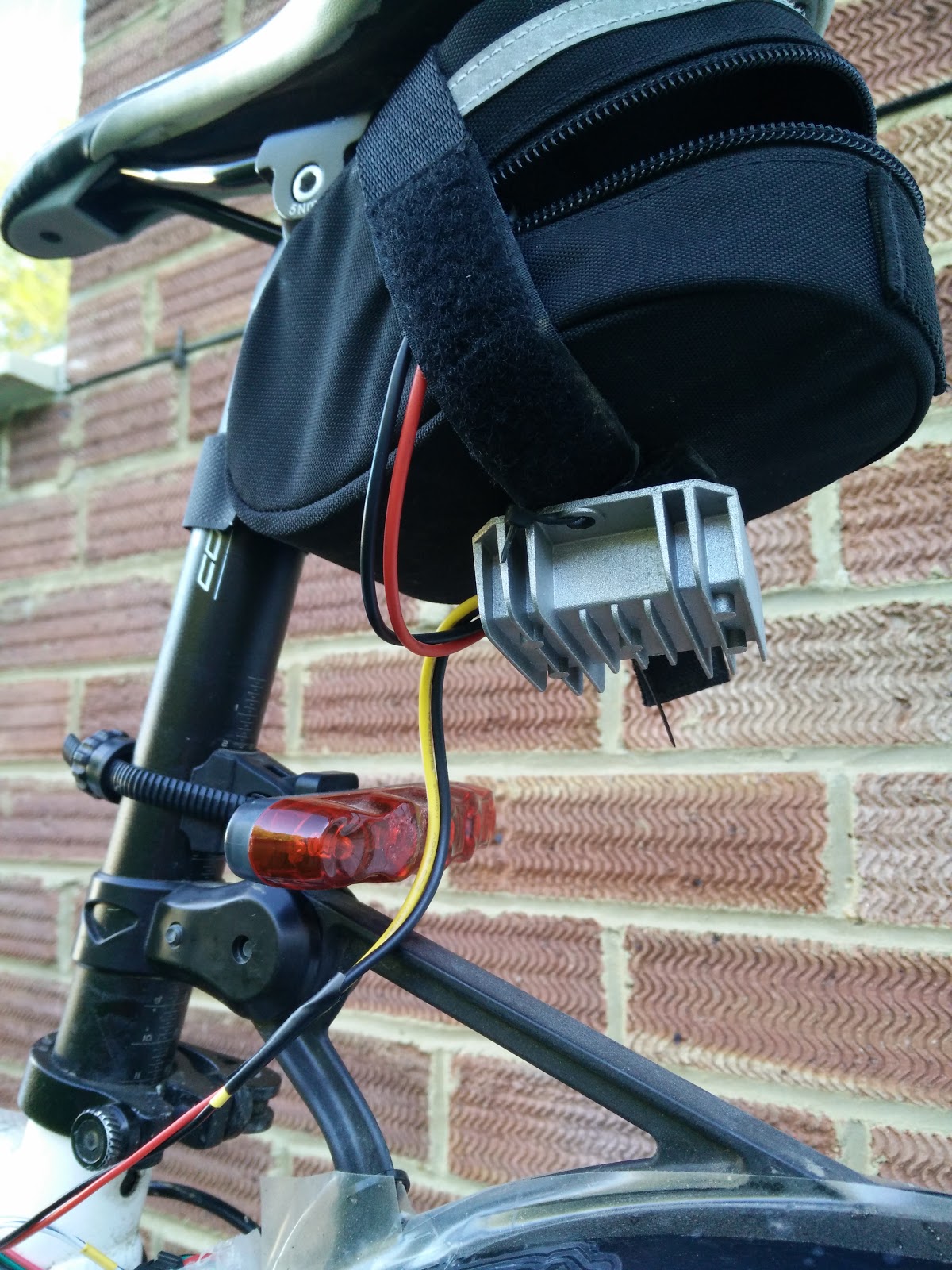 The 12/24 > 5v 10amp converter (another eBay purchase I had lying around) was cable tied under the saddle bag.